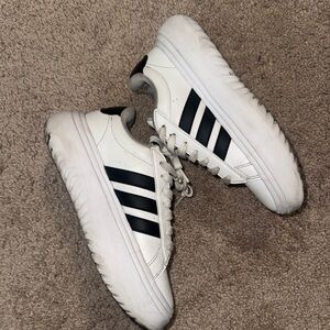 All white platform adidas sneakers